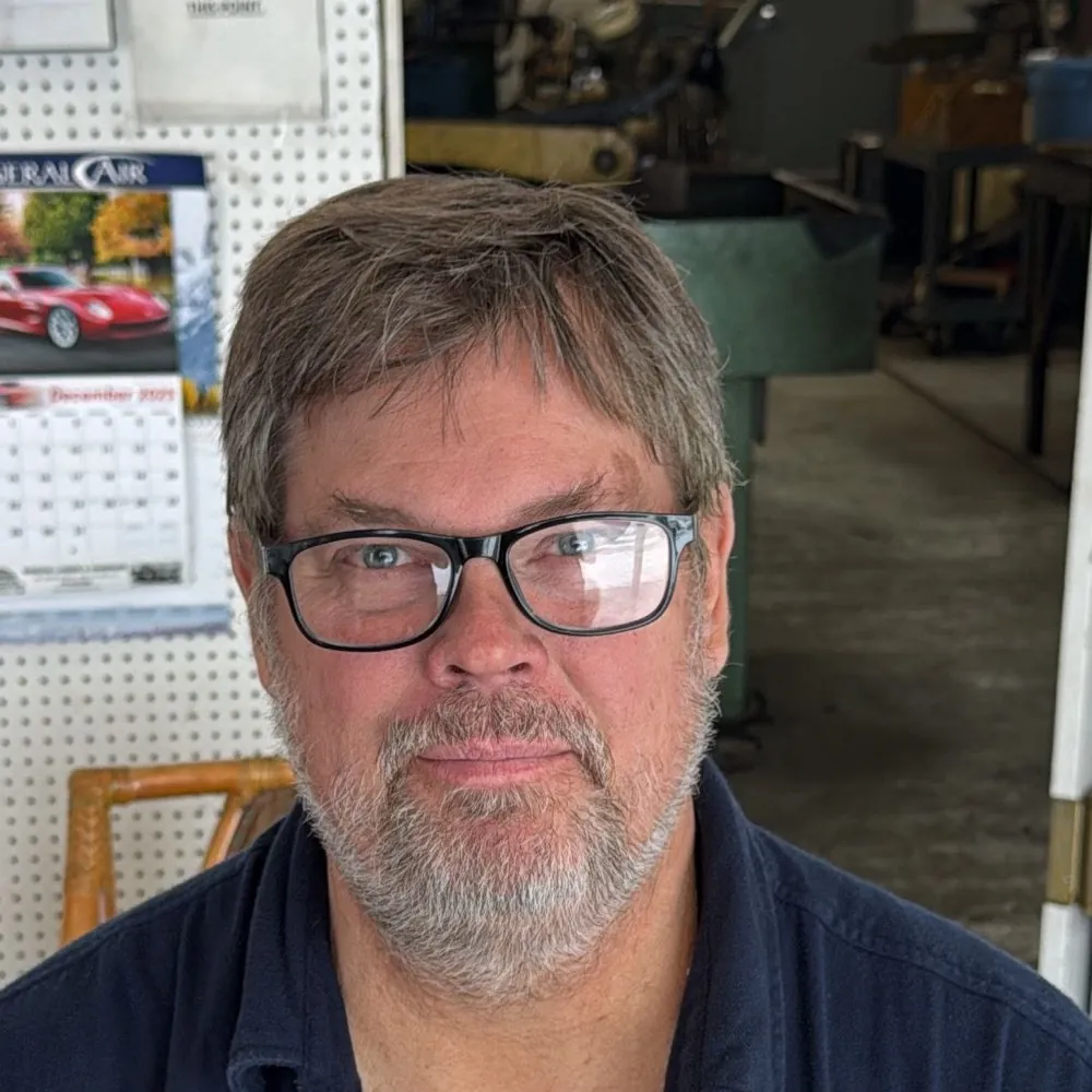 Paul Dudley, owner of Rocky Mountain Sharp Shop, in the shop
